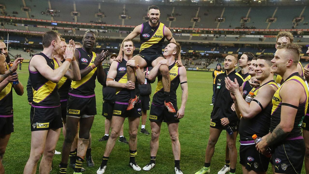 Edwards is chaired off the MCG after his winning 250th. Pic: Michael Klein