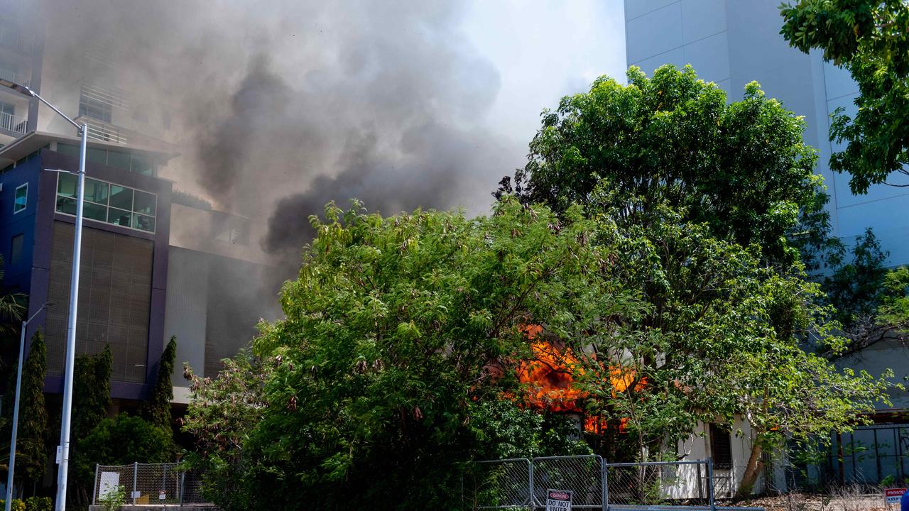 A fire has totally destroyed a house right next to DarwinÃ&#149;s tallest high-rise building, with the full range of emergency services rushing to the scene of the ferocious blaze. The fire on McMinn St is under investigation. picture: Che Chorley