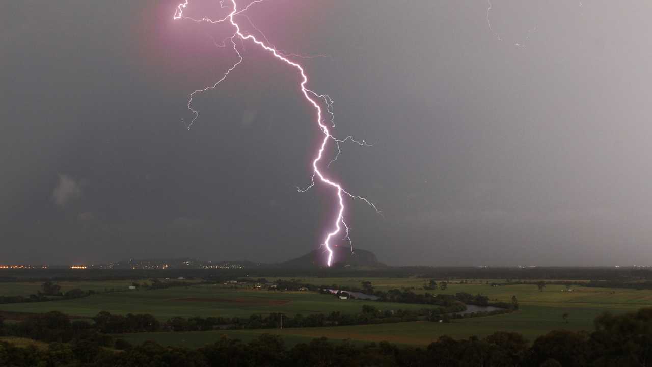 Lightning strikes near family home during terrifying storm | The Courier  Mail