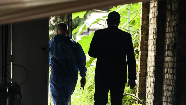 Police investigating the property on Friday. Picture: Darren Leigh Roberts