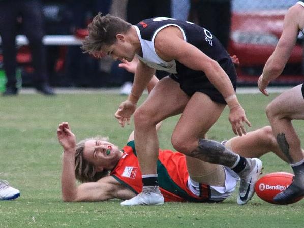 Mitch Rule moments after the bump that left him with a broken neck. Picture: Davis Harrigan