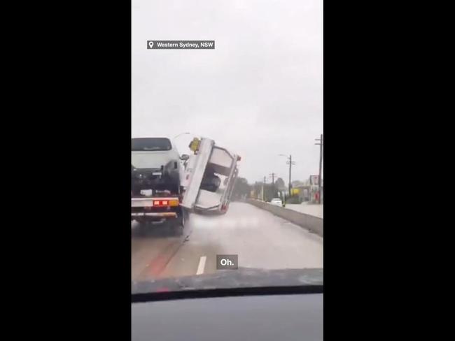 Clueless Sydney tow truck driver loses his load