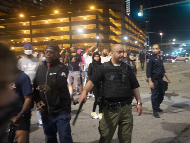 Detroit police detain and arrest protesters during a series of confrontations in Detroit, Michigan. Picture: Getty