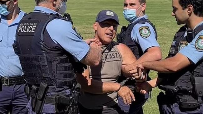 Dog walker Dimitri Gabriel was charged with intimidation after allegedly verbally abusing passers-by in a Sydney dog park. He was tackled to the ground by police in footage of the arrest. Picture: Supplied