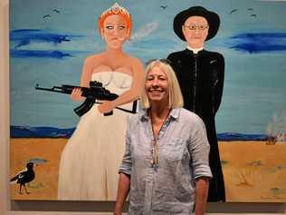 LOVE IT: Local artist Sandra Allen and her painting  The Bride Waited and Waited . Her exhibition opens tonight at the Roma on Bungil Gallery. Picture: Ellen Ransley