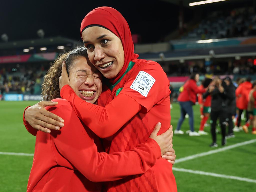 Fatima Gharbi and Nouhaila Benzina of Morocco celebrate advancing to the knockout stage after a 1-0 victory against Colombia in Perth. Picture: Alex Grimm/Getty Images