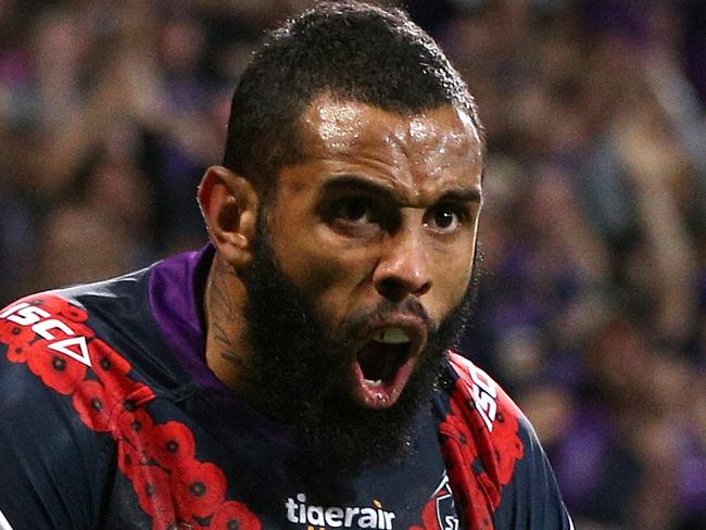 Josh Addo-Carr of the Storm scores a try during the Round 8 NRL match between the Melbourne Storm and the New Zealand Warriors at AAMI Park in Melbourne, Wednesday, April 25, 2018. (AAP Image/Hamish Blair) NO ARCHIVING, EDITORIAL USE ONLY