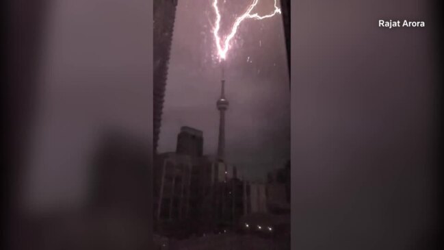 A bolt of lightning strikes Toronto’s CN tower