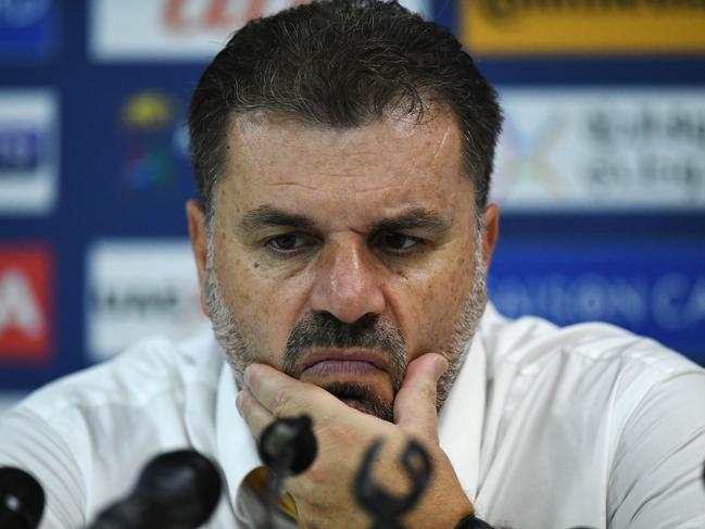 Australia's football coach Ange Postecoglou reacts during a press conference after the 2018 World Cup qualifying football match between Syria and Australia at the Hang Jebat Stadium in Malacca on October 5, 2017. / AFP PHOTO / MOHD RASFAN