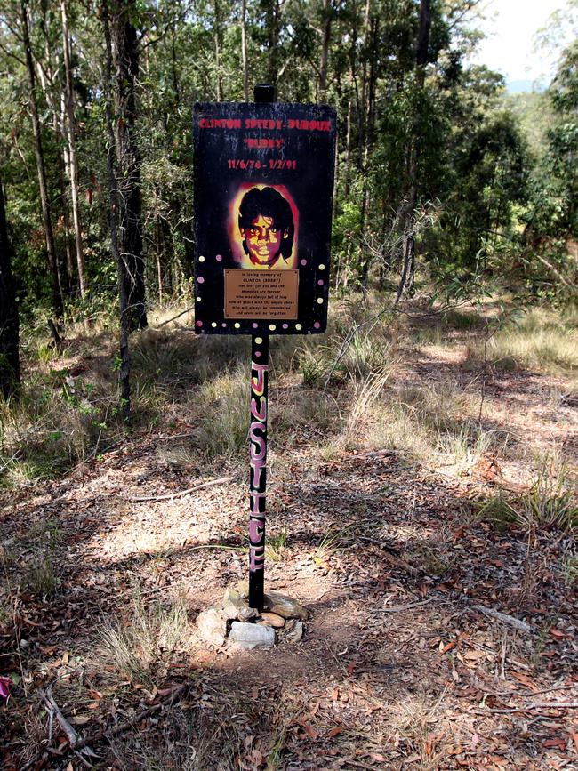 A memorial for Clinton Speedy in bushland where his body was found