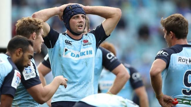 Waratahs veteran Dean Mumm reacts after the Crusaders score.