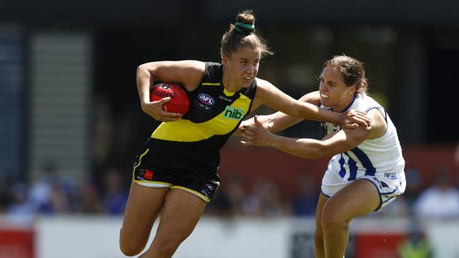 Ellie McKenzie, in her second game of the season, delivers a ‘don’t argue’ to North Melbourne star Jasmine Garner. Picture: Getty Images