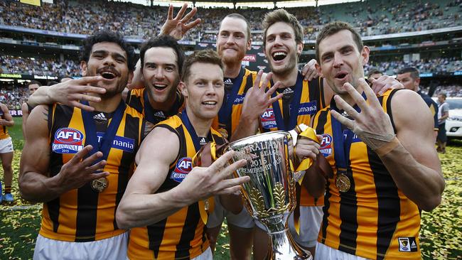 Sam Mitchell with fellow four-time premiership winners (from left) Cyril Rioli, Jordan Lewis, Jarryd Roughead, Grant Birchall and Luke Hodge. Picture: Wayne Ludbey