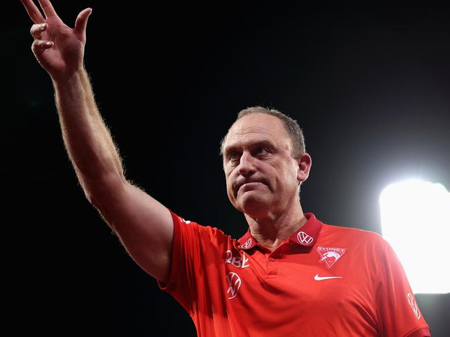 SYDNEY, AUSTRALIA - JUNE 09: John Longmire, Senior Coach of the Swans thanks fans after winning the round 13 AFL match between Sydney Swans and Geelong Cats at SCG, on June 09, 2024, in Sydney, Australia. (Photo by Cameron Spencer/Getty Images)