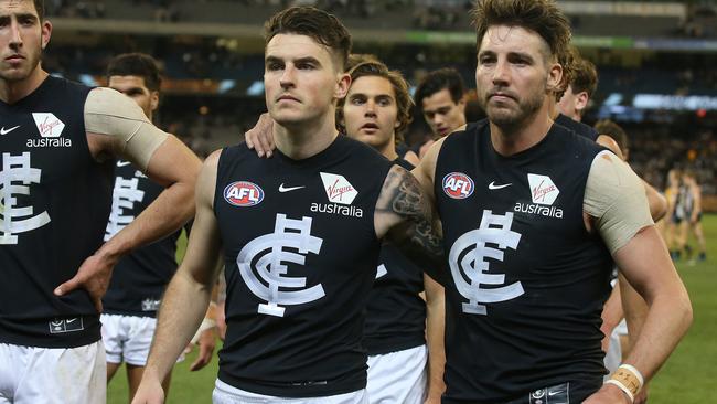 Aaron Mullett and Dale Thomas after the game. Picture: Michael Klein