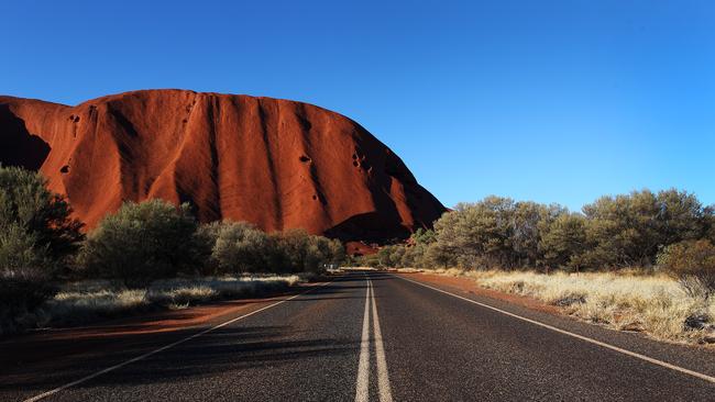 A view from the roadway of Uluru as seen on August 12, 2019 in the Uluru-Kata Tjuta National Park, Australia. (Photo by Lisa Maree Williams/Getty Images)