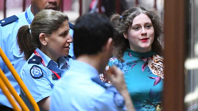 Jamie Lee Dolheguy smiles as she arrives at the Supreme Court of Victoria for her trial. Picture: AAP Image/James Ross