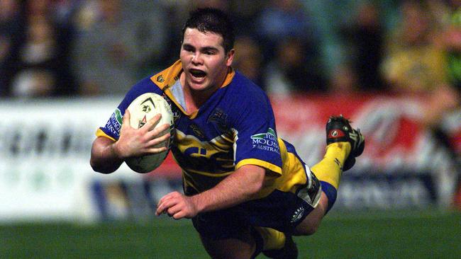 A fleet-footed Jamie Lyon flies in for a try.. Picture: AAP