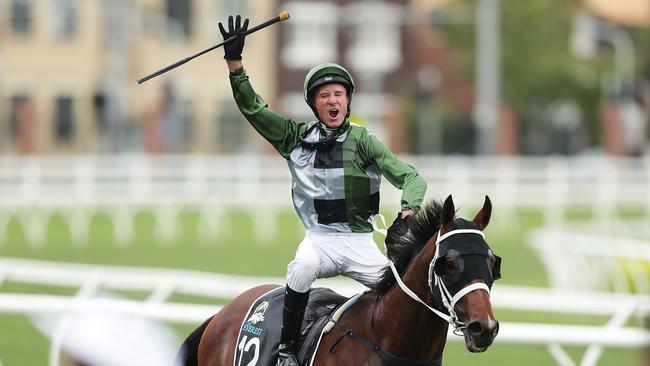 Glen Boss riding Yes Yes Yes celebrates after winning The Everest in 2019. Picture: Mark Metcalfe/Getty Images