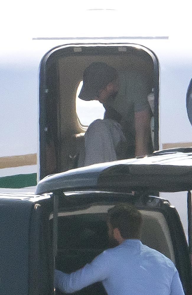 Prince Harry, pictured exiting the private plane paid for by Sir Elton John. Picture: EliotPress/MEGA TheMegaAgency.com