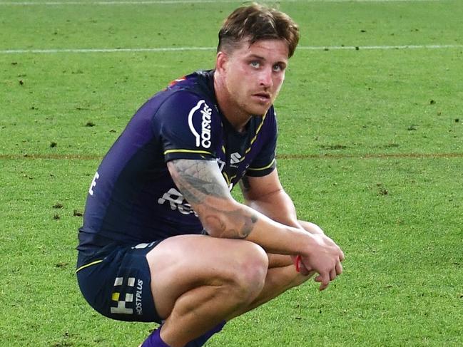 BRISBANE, AUSTRALIA - SEPTEMBER 25: Cameron Munster and Harry Grant of the Storm looks dejected after defeat during the NRL Preliminary Final match between the Melbourne Storm and the Penrith Panthers at Suncorp Stadium on September 25, 2021 in Brisbane, Australia. (Photo by Bradley Kanaris/Getty Images)