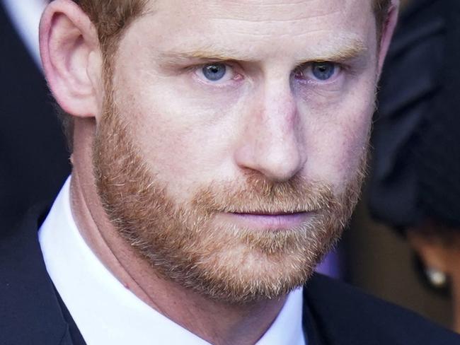 Britain's Prince Harry, Duke of Sussex and Meghan, Duchess of Sussex leave after a service for the reception of Queen Elizabeth II's coffin at Westminster Hall, in the Palace of Westminster in London on September 14, 2022, where the coffin will Lie in State. - Queen Elizabeth II will lie in state in Westminster Hall inside the Palace of Westminster, from Wednesday until a few hours before her funeral on Monday, with huge queues expected to file past her coffin to pay their respects. (Photo by Danny Lawson / POOL / AFP)