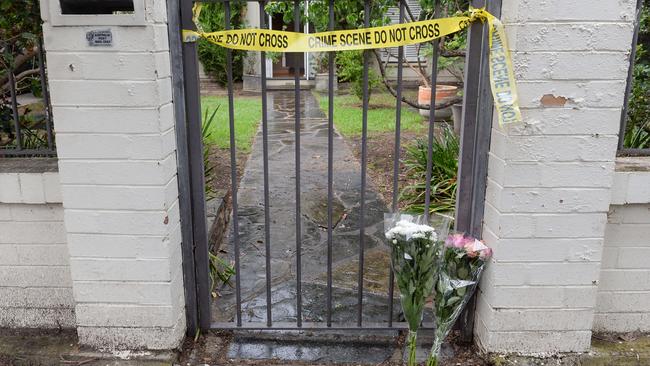 Flowers at the front gate of murdered pediatrician Dr Michael Young in James St, Gilberton. Picture: NCA NewsWire / Brenton Edwards