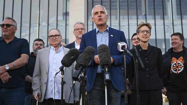 Qantas workers, TWU national secretary Michael Kaine, ACTU secretary Sally McManus and senator Tony Sheldon hold a press conference at the High Court in Canberra after the court ruled Qantas had illegally sacked nearly 1700 workers in 2020. Mr Kaine says the company’s culture is in crisis and the entire board needs to be replaced. Picture: NCA NewsWire / Martin Ollman