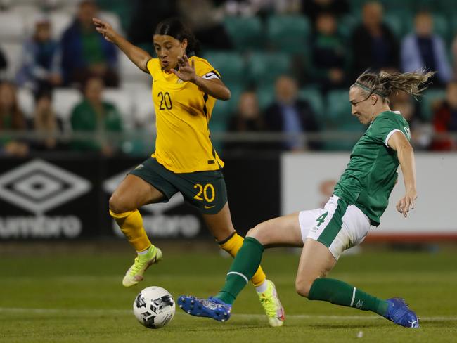 TALLAGHT, IRELAND - SEPTEMBER 21: Australia Commonwealth Bank Matildas' Samantha Kerr with Louise Quinn of Ireland at Tallaght Stadium on September 21, 2021 in Tallaght, Ireland. (Photo by Oisin Keniry/Getty Images)
