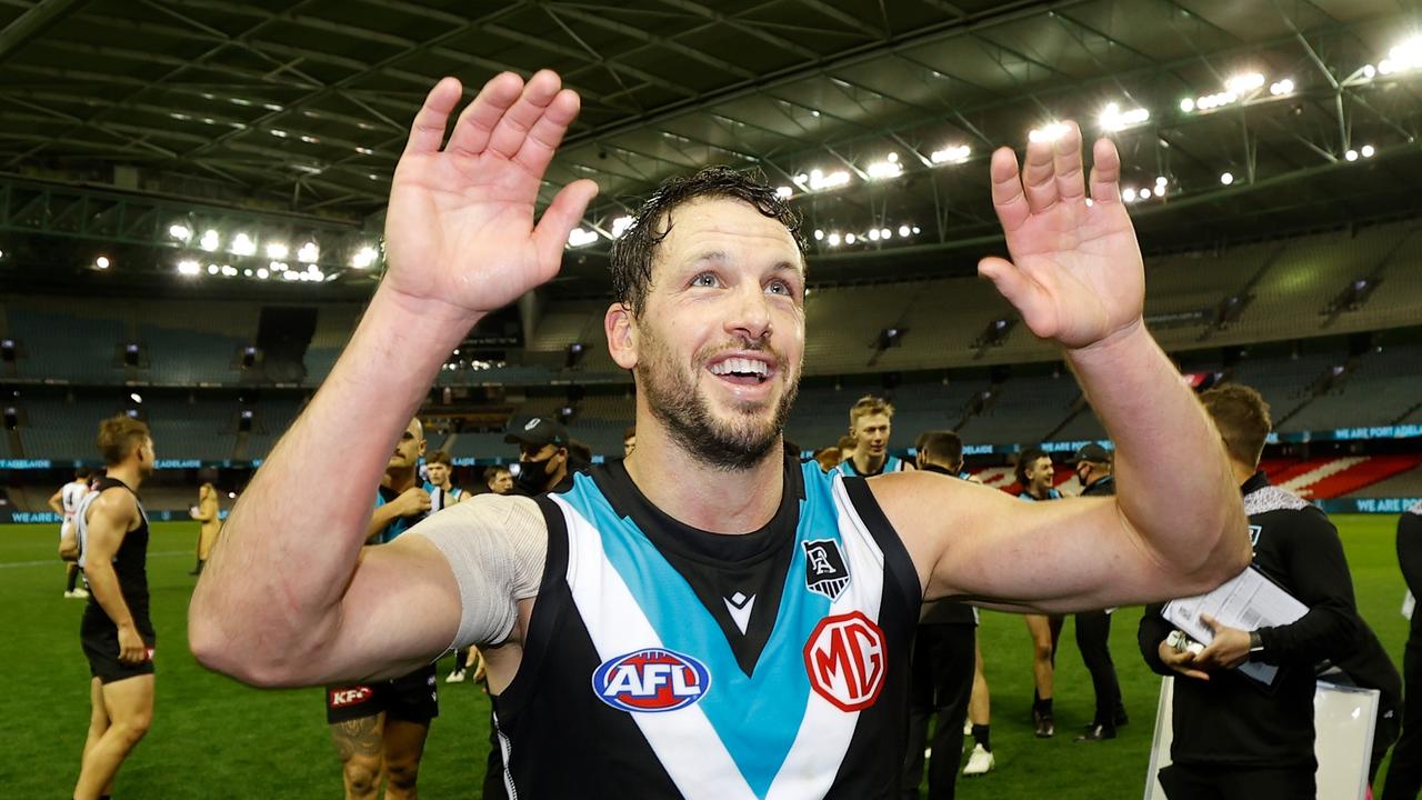 MELBOURNE, AUSTRALIA – JULY 23: Travis Boak of the Power celebrates after his 300th match during the 2021 AFL Round 19 match between the Port Adelaide Power and the Collingwood Magpies at Marvel Stadium on July 23, 2021 in Melbourne, Australia. (Photo by Michael Willson/AFL Photos via Getty Images)