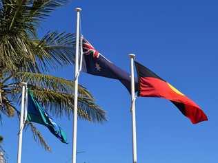 HIGH AND PROUD: The Torres Strait Island, Australian and Australian Aboriginal flags. Picture: Christine McKee