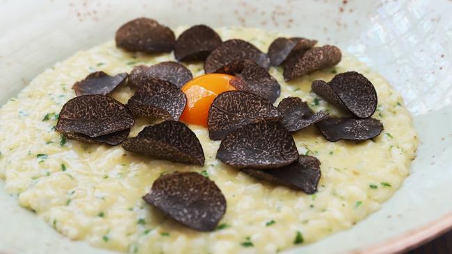 Cafe Sydney’s risotto with truffle and a hen’s egg. Picture: Jenifer Jagielski