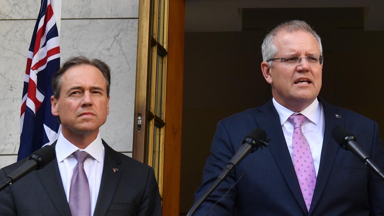 Health Minister Greg Hunt with Prime Minister Scott Morrison.