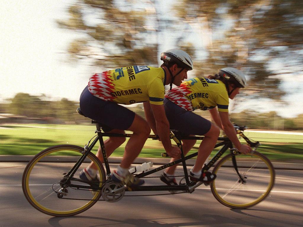 Kieran Modra on a tandem bicycle with wife Kerry.