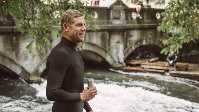 Mick Fanning is seen preparing to surf the Eisbach, a man-made river that generates a permanent wave in the English Gardens in Munich, Germany on September 29, 2017. Photo: Cory Wilson/Red Bull