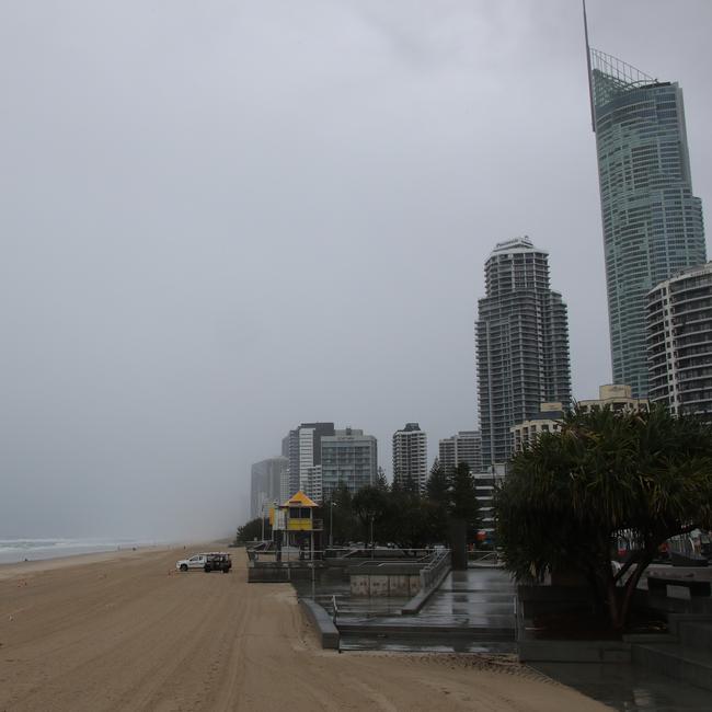 Day three of the Gold Coast lockdown. Empty beach at Surfers Paradise. Picture Glenn Hampson