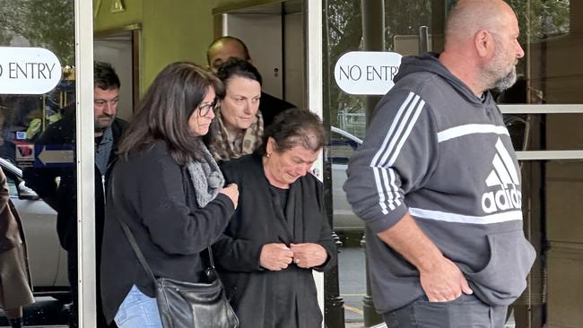 Francesca Macheda, centre, wife of Giuseppe ‘Joe’ Macheda, leaves the District Court with supporters after hearing sentencing submissions for Robert Michael Ryan. Picture: Eva Blandis