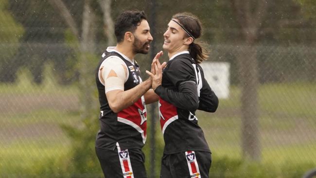 MPNFL football  Div 1: Bonbeach v Pines. Bonbeach players celebrate a goal. Picture: Valeriu Campan