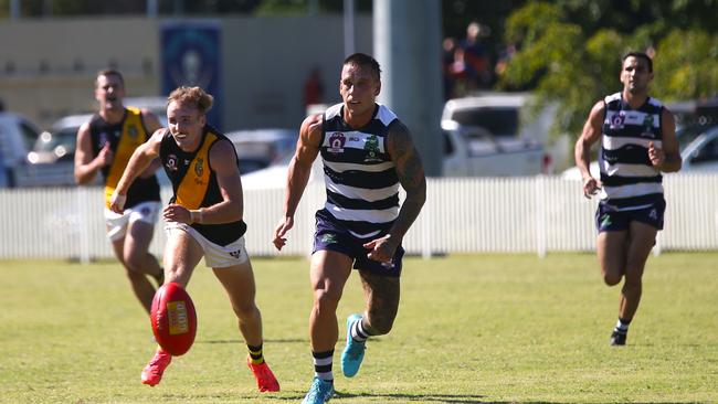 Pictured (l-r): Tigers James Neale and Crocs Liam Brandt. Port Douglas Crocs v North Cairns Tigers. AFL Cairns 2024. Photo: Gyan-Reece Rocha