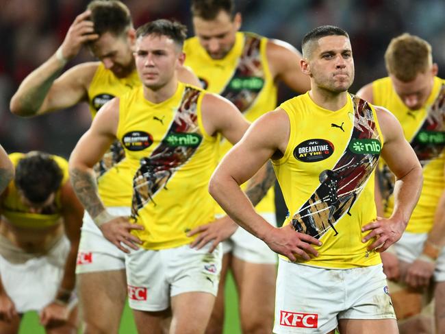 MELBOURNE, AUSTRALIA - MAY 20: The Tigers look dejected after losing the round 10 AFL match between Essendon Bombers and Richmond Tigers at Melbourne Cricket Ground, on May 20, 2023, in Melbourne, Australia. (Photo by Quinn Rooney/Getty Images)