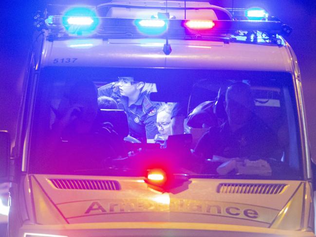 Police attending to an incident at the Liberty Sunnybank Hills fuel stationon Compton rd,  Runcorn.  An ambulance leaves the scene followed by two  QPS vehicles. Picture: Jerad Williams