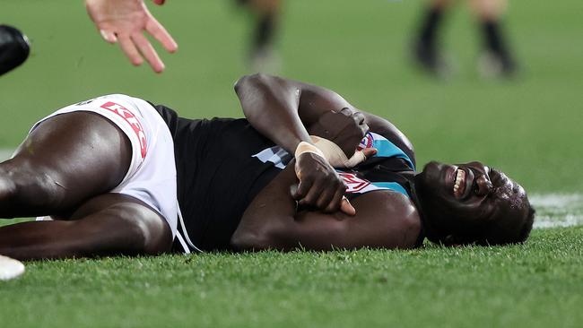 Aliir returned to the ground without receiving a concussion test. (Photo by Sarah Reed/AFL Photos via Getty Images)