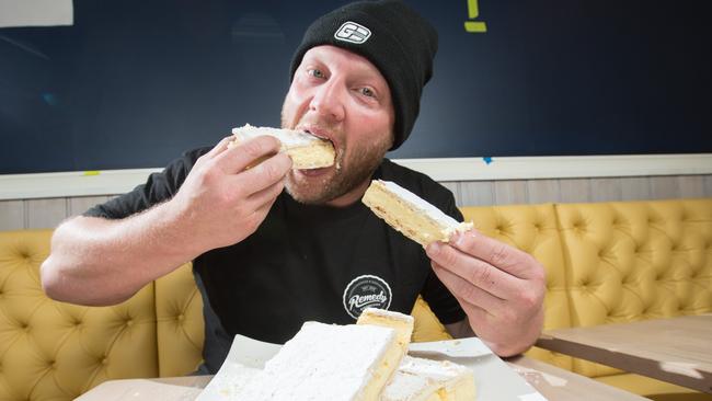 Tucking into a vanilla slice in Sorrento. Picture Norm Oorloff