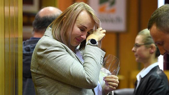 Cr Cheryl Bromage wipes away tears following the Ipswich City Council's final meeting. Picture: Dave Hunt/AAP