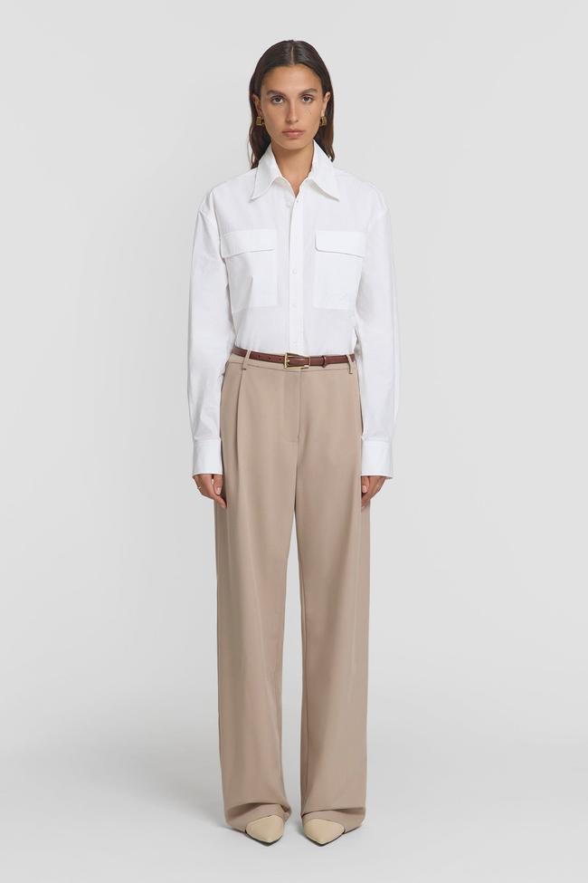 Viktoria & WoodsIdol PantSoft and lightweight suit pants in a summery neutral shade will never go out of workwear style. This pair from Viktoria & Woods stars a comfy, wide leg silhouette with elegant tailored details to elevate it for the office.Type: Pants | Material: Viscose, nylon | Colour: Sand, beige, brown, grey, charcoal, black | Delivery: Free over $300Shop now for $350
