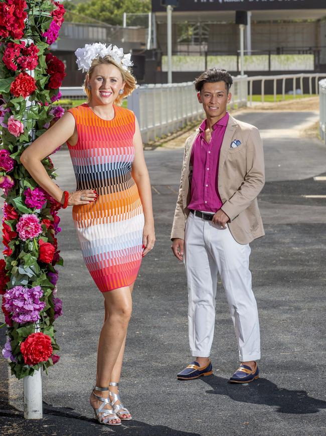                         <s1>Lauren Holland, wearing Joli Boutique Marccain knit dress and Joli Boutique Millinery silk rose headband, and Savida Shoes silver heel, and Maxwell Steven, in Harrisons Menswear attire, are set for the raceday.           </s1>                        <source id="U33447605919Q0C" style="font-size:7;">Picture: AAP/RICHARD WALKER</source>                     