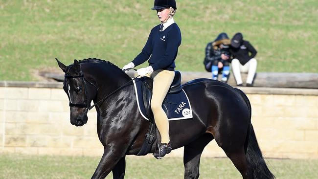 Sarah Olsen rides We Love Lola in the working hunter event. Picture: Oz Shots Photography