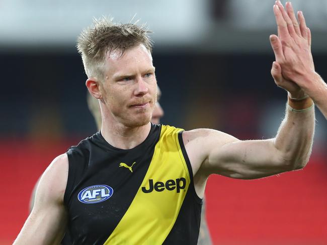 GOLD COAST, AUSTRALIA - JULY 18: Jack Riewoldt and Nathan Broad of the Tigers walks celebrate winning the round 7 AFL match between the Richmond Tigers and the North Melbourne Kangaroos at Metricon Stadium on July 18, 2020 in Gold Coast, Australia. (Photo by Chris Hyde/Getty Images)