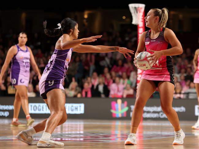 Adelaide’s Georgie Horjus is defended by Firebirds’ Hulita Veve. Picture: Getty Images