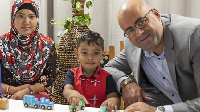 Aziza, Arshad and Canterbury Bankstown mayor Khal Asfour at the Lakemba Children's Centre. 